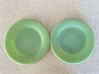 front view of both jadeite plates
