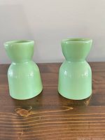Two jadeite egg cups front view