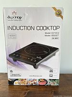Retail box showing Duxtop induction cooktop specifications