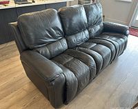 Front left perspective of leather La-Z-Boy three-seat sofa