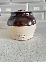 Front view showing blue crown 2-quart mark and lid