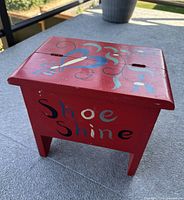 front view showing painted lettering and motif