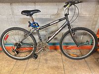 Full left-side view of SuperCycle Chinook mountain bike showing frame, wheels, drivetrain and overall condition
