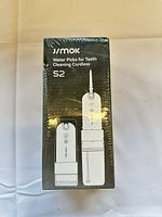 Front of factory-sealed Jimok S2 flosser box