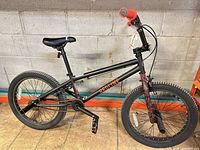 Full side view of Redline 20-inch BMX bike