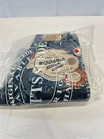 Factory-sealed Skotts suede leather jacket bag showing branding and tags