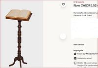Full view of solid wood mahogany-finished lectern stand with open book on tilting top, turned column and tripod base