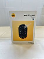 Front of box showing Yale Keypad Touch image and branding