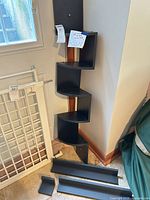 Corner wall shelf and three floating shelves laid out