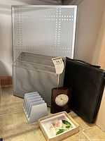 All items grouped: file sorter, letter sorter, clock, portfolio, cards, mounting panel