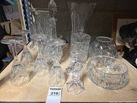 Wide shot of all twelve pieces on shelf