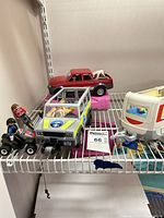 Overall view of vehicles on shelf
