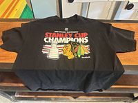 Front view of black 2013 Chicago Blackhawks Stanley Cup Champions Reebok T-shirt size 2XL