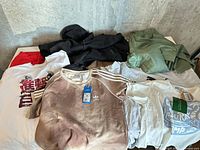 Overview of all six clothing items laid out