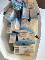 Open bag showing sealed Allenburys boxed soaps and one foil-wrapped bar