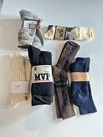 All six pairs/packages of socks laid out