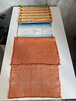 All four placemats laid out to show colors and quantity