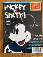 Front cover of Mickey Is Sixty magazine showing title graphics