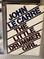 Front cover of The Little Drummer Girl showing title and author