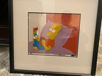 Framed cel showing entire artwork of Bart Simpson reclining