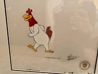 Close view of cel showing Foghorn Leghorn image, 1983 copyright, signature and seal visible