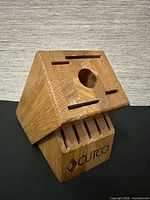 Front view showing slot arrangement and Cutco logo