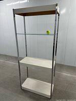 Full view of assembled chrome and laminate display shelf