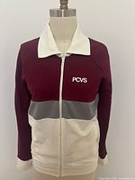 Front view showing color blocking, PCVS logo and Talon zipper