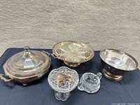 All items grouped together showing range of silver plate and crystal pieces