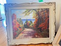 Front view of framed painting showing entire artwork