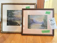 Both framed pastel artworks side by side with size labels