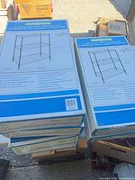 Stack of five sealed boxes showing product diagram and dimensions