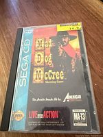 Front of Sega CD Mad Dog McCree case showing cover art and rating sticker