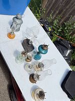 Overview of all oil lamps and lantern on table