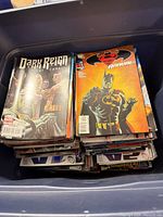Top view of tote showing stacks with Dark Reign: The Cabal and Superman/Batman Annual visible