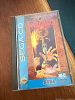 Front of jewel case showing Double Switch cover art and Sega CD spine
