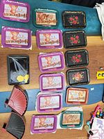 Overview of all trays and napkin holders laid out on table