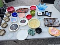 Overview showing all ashtrays on table
