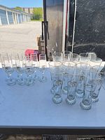 Group shot of all glassware on table showing quantity and two styles