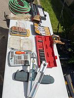 Overall view showing hose, bit kits, socket set, angle finders