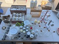 overall view of assorted glassware, shakers, cruets, tumblers, mugs, racks