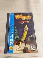 Front view of Sega CD Wild Woody case
