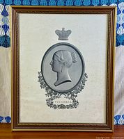 Full view of framed Queen Victoria print showing frame style and artwork