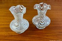 Both vases front view on wood surface