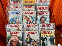 Front view of full rack showing multiple bagged MAD magazines