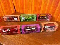 Six boxed Matchbox Models of Yesteryear cars displayed