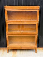 Full frontal view of the three-section Prestonia barrister bookcase