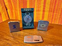 Group shot showing all four Zippo promotional items
