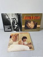 Front covers of all three LPs