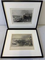 Both framed engravings front view